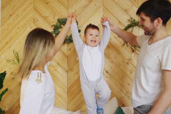 Parents playing with their child